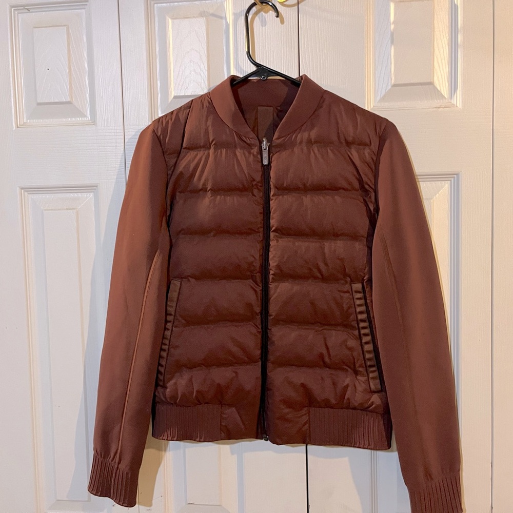 Lululemon brown, puffer vest long sleeve. Very warm and comfortable.